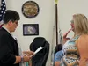 City of Houston Clerk Tani Schoneman administers the oath of office to interim councilwoman Laura Faubert, who was elected by current city council members during a special election July 11, 2