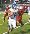 Palmer senior Chase Ferris runs toward the sideline durng a 42-6 Potato Bowl win over Wasilla Oct. 2 at Wasilla High School. Ferris finished with a career-high 316 yards rushing. Courtesy of 