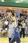 Colony senior Saige Stefanski takes a shot over the reach of Palmer senior Kasara Brandenburg during Colony's 36-32 win over the Moose Wednesday at Colony High. For more photos of the game, s