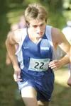 ROBERT DeBERRY/Frontiersman Palmer's Lauri Husa makes his way up
a hill Saturday during the Region III Cross Country Championships
at Colony High School.