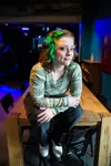 If you’ve ever been at Williwaw Social in Anchorage on a Friday night, you’ve likely seen a green-haired typhoon zipping past you at incredible speeds. The person behind the blur of motion is
