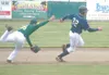 JEREMIAH BARTZ/Frontiersman Mat-Su first baseman Shane Brown,
dives toward Lake Erie right fielder Doug Schumacher was caught
between first and second during the second inning.