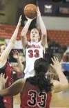 ROBERT DeBERRY/Frontiersman Wasilla’s Kyla Dinkel puts up a jump
shot Saturday against the Juneau-Douglas Crimson Bears during the
4A state championship game. Wasilla defeated Juneau-Douglas 