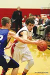 Wasilla guard Chris Trotta-Mirigliano works around the defense during a 64-57 win over Palmer Tuesday at Palmer High School. Photo courtesy of 
Bruce Eggleston/matsusports.net