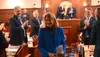 Sen. Lisa Murkowski, R-Alaska, smiles on Tuesday, March 18, 2025, as she exits the Alaska House of Representatives following her annual address to the Alaska Legislature. James Brooks/Alaska 