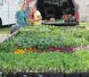 Jan Newman and daughter, Kierney, with trailer load of plants Jenny Weaver/For the Frontiersma