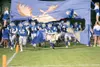 ROBERT DeBERRY/Frontiersman Palmer’s Dustin Silva (16), Dan
Contini (52), Evan Parsons (64), Jim McCall (21) and Johnny Daly
(28) lead their teammates out on to Machetanz Field prior to the
s