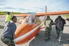 Civil Air Patrol cadet ground crew reposition Cadet Logan Platz (center) and Maj. Jim McCarthy, CAP glider instructor, in a Schweitzer SGS 2-33 glider during the Alaska Wing Summer Glider Aca