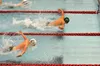 Colony's Jake Simmons and Joseph Anderson compete during the Kenai Invitational Sept. 19 in Kenai. Simmons remained undefeated this season with wins in the 200 individual medley and 100 butte