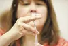 ROBERT DeBERRY/Frontiersman State of Alaska Public Health Nurse
Elaine Marquez fills a syringe with a Varicella vaccination Friday
at Iditarod Elementary.
