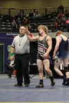 Colton Lindquist has his hand raised in victory after the 171-pound final at the ASAA/First National Bank State Wrestling tournament at the Alaska Airlines Center on the University of Alaska 