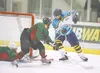 ROBERT DeBERRY/Frontiersman Defenseman Braden Kinnebrew wraps
around the net and scores a goal against the Kenai River Brown
Bears earlier this season. After being dealt to Wichita Falls in
D