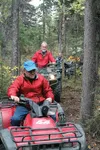 Mat-Su Borough Mayor Vern Halter leads a caravan of ATV's through new trails at Jim's Creek on Wednesday following a ribbon-cutting ceremony. (CHRIS FORD/Frontiersman)