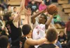 Wasilla’s Cameron Brown drives to the basket during a Warriors win over the Kenai Kardinals Thursday in the Northern Lights Conference Championships quarterfinals at Colony High School. ROBER