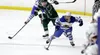 Palmer's Stuart McQuillin skates the puck down the ice during a game against Colony. Courtesy of Ron Jones/matsusports.net