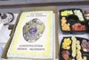 (ANDREW WELLNER/Frontiersman) The food table at the Alaska State
Troopers' yearly awards ceremony which doubled as Capt. Dennis
Casanovas' going away party Thursday holds this specially made
