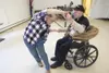 Jody Linsey, recreation director for the Palmer Veterans and
Pioneers Home, twirls around while dancing with Phil Plack at
American Legion Susitna Valley Post 35 Thursday afternoon. (ROBERT
D