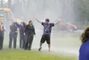 Two staff members from Houston High and Houston Middle schools are soaked during their participation in the ALS challenge Thursday at Houston Middle School. The popular challenge, normally un