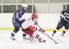 ROBERT DeBERRY/Frontiersman Wasilla junior forward Trent Wohlers
moves the puck across the ice during a game against the Soldotna
Stars at the Curtis C. Menard II Memorial Ice Arena in Wasill