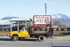 A truck parked in downtown Palmer carries a sign asking people to weigh in on the proposed monofill. HEATHER A. RESZ/Frontiersman