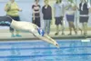 ROBERT DeBERRY/Frontiersman Palmer's Tannere Shelton dives off
the starting platform in the fourth position of the boys 400 yard
butterfly relay Saturday at Palmer high School.