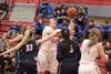 Wasilla senior Leya DePriest puts up a shot while in a crowd of players during a victory over Coranado High School of Henderson, Nevada, earlier this season. DePriest is part of a 2015-16 tea