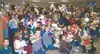 Students at Goose Bay Elementary enthusiastically show their
Teddy bears at the close of a two-week project initiated by
librarian Abby Kellner-Rode. Photo by AMY MENEREY/Frontiersman.
