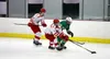 Wasilla’s Mason Mulneaux works to keep the puck away from Service’s Jack Carter during a 7-3 win over the Cougars at the Brett Memorial Ice Arena. Courtesy of Bruce Eggleston/matsusports.net