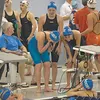 Palmer’s 400 freestyle relay team (Noelle Graham, Sarah Hanson, Naomi Graham and Katie Stark) react after winning a state title Saturday during the final day of the ASAA/First National Bank S