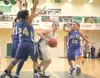 Palmer Moose Jaimi Cox far left, Amy Tzou, center and Ashley
Swetzof surround Colony Knight Alex Coon during Friday's game at
Colony High School. ROBERT DeBERRY/Frontiersman