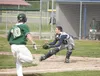 Alaska Road Warriors catcher Morgan McJimsey sets up the play at home plate as he waits for the ball during a 4-3 win over Service recently. ROBERT DeBERRY/Frontiersman
