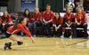 Wasilla players and coaches watch as Denisha Christiansen grabs a dig during a 3-2 win over Kodiak on the second day of the ASAA/First National Bank 4A State Volleyball Championships. JEREMIA