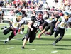 Houston senior Noah Griffeth runs for a gain during a 45-12 win over Seward Aug. 22 at Houston High School. Griffeth scored four times in the victory. JEREMIAH BARTZ/Frontiersman