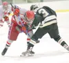 ROBERT DeBERRY/Frontiersman Former Wasilla Warriors forward
Matthew Friese battles for the puck during a ASAA 4A state
tournament game against South Anchorage during his sophomore
season. Fri