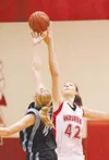 ROBERT DeBERRY/Frontiersman Wasilla’s 6-foot-5 junior post
Kelsey Cottle, right, has been named to the first team of the
Alaska Newspapers Inc./Alaska Coaches All-State Basketball Team