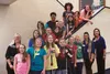 Members of the Houston and Palmer Junior Middle School Braille Clubs line the stairwell after a full day making Braille plaques for all the classrooms at Palmer for the visually impaired. Spe
