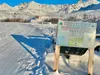 A Mat-Su Ski Club sign at Independence Mine sits next to the recently groomed trail Nov. 5, 2022. Trail reports can now be viewed in real time on the club's website.  Amy Bushatz/For the Fron