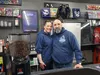 Luis and Amie Nieves stand indisde their new coffee shop in their comic shop. Jacob Mann/Frontiersman