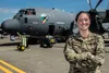 U.S. Air Force Capt. Jane Kaufmann, a combat systems officer with the 73rd Special Operations Squadron, poses in front of an AC-130J Ghostrider gunship at Hurlburt Field, Florida, Mar. 13, 20