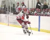 Wasilla senior defenseman William Harren moves the puck down the ice during the Warriors’ win Friday over the Homer Mariners at the North Star Conference Hockey Championships at the Curtis C.