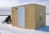 Valley resident Butch Ehmann tows the family fishing shack across Lake Louise. The Mat-Su Borough Planning Commission declined June 17 to endorse a plan to tighten up regulations regarding ic