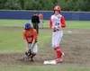 Palmer's Carson McLaughlin catches the ball off a hop as Wasilla's Nolan Murphy gets back to first base. Jeremiah Bartz/Frontiersman