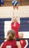 ROBERT DeBERRY/Frontiersman Wasilla junior Kayla Binggeli goes
up for the block during the Palmer Jamboree last Friday at Palmer
High School. Binggeli and the Warriors finished first in the
e