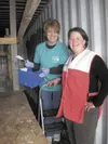 Red Cross Disaster Director Kelley McGuirk thanks Matanuska
Telephone Association team member and volunteer Carla Flodin, who
volunteered during United Way’s annual Day of Caring May 19.
(Cou