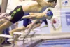 Colony Knight Zane Mileur gets a good start in the boys 50 yard
freestyle event at Saturday's Valley invite at Palmer High School.
(ROBERT DeBERRY/Frontiersman)