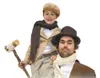 Tiny Tim, played by Andrew Mattson, sits on the shoulders of his
father, Bob Cratchit, played by Theron Blair, during Valley
Performing Art’s production of ‘A Christmas Carol.’