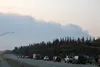 Traffic is stopped on the Parks Highway near Mile 71 as smoke from the McKinley Fire fills the sky. Tim Rockey/Frontiersman