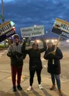 Supporters of Doug Holler wave signs for the candidate for Wasilla mayor. Courtesy photo