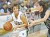 Colony senior guard Hayley Hotchkiss drives the ball towards the
basket during the final period of the Knights 49-45 win over the
Chugiak Mustangs Saturday in Anchorage. (ROBERT
DeBERRY/Front