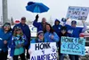 Dozens of people showed up on a dreary, rainy morning, wearing blue, waving signs, and raising awareness to Child Abuse Prevention Month and support the mission of The Children’s Place. Katie